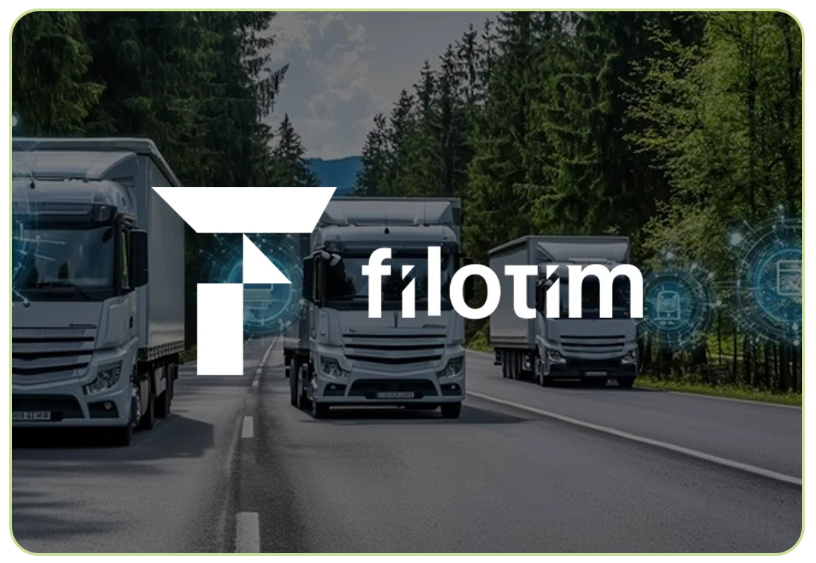 Filotim logo over a photograph of trucks on a highway